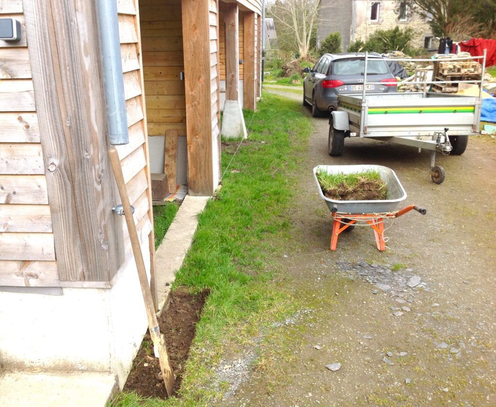 Digging the trench to make the garage ground gutter