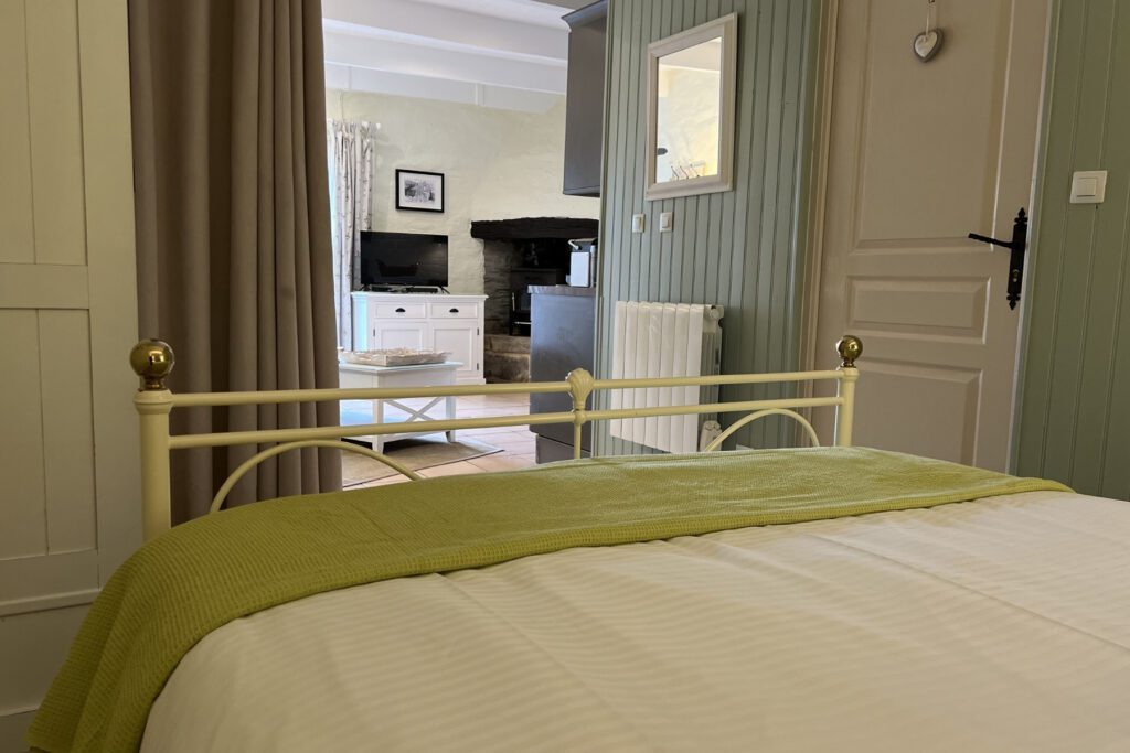 Wood-burning stove inside Hayloft Gîte, perfect cosy ambience for couples in Brittany.