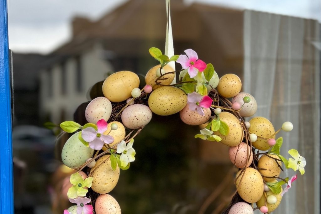 Easter Wreath with Eggs on a door with beautiful gites in brittany in the reflection